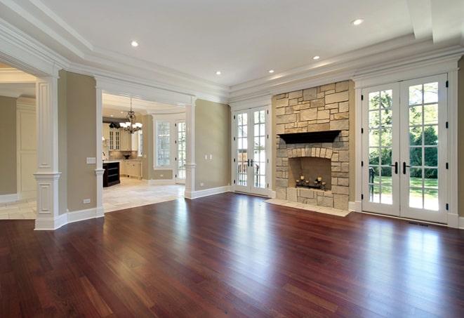 highly polished cherry hardwood floors in a kitchen